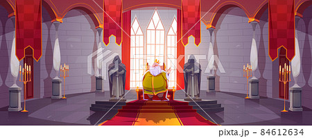 King in gold crown on throne in medieval castle 84612634