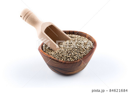 Cannabis Hemp seeds in scoop on white 84621684