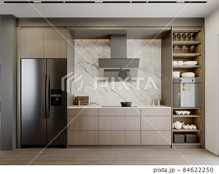 Brown-and-beige kitchen with large black refrigerator and extractor hood with oven on a white marble wall background. 84622250