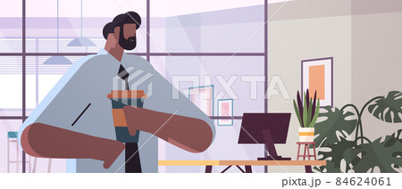 african american businessman drinking coffee business man having coffee break office interior 84624061