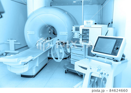 Medical CT or MRI Scan in the modern hospital laboratory. Interior of radiography department. Technologically advanced equipment in white room. Magnetic resonance diagnostics machine. 84624660