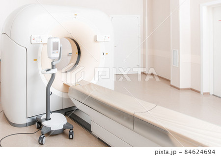 Medical CT or MRI Scan in the modern hospital laboratory. Interior of radiography department. Technologically advanced equipment in white room. Magnetic resonance diagnostics machine. 84624694