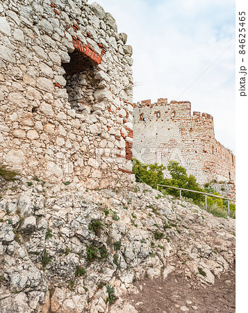 Climbing to a castle from the thirteenth century built from white limestone. Climbing to a castle from the thirteenth century built from white limestone. 84625465