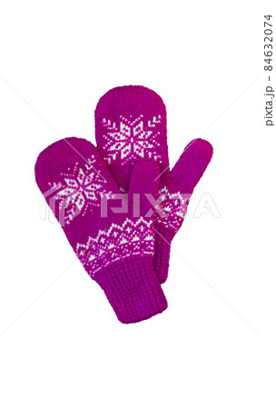 pair of pink lilac purple knitted mittens with christmas pattern isolated on 84632074