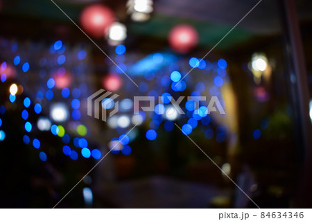 colorful blurry festive lights bright blue defocused christmas holiday illumination 84634346