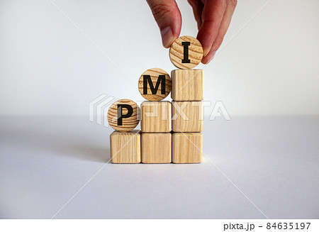 Business concept growth success process. Male hand. Wood blocks and circles with word 'PMI, purchasing manager index' stacking as step stair on white background, copy space. 84635197