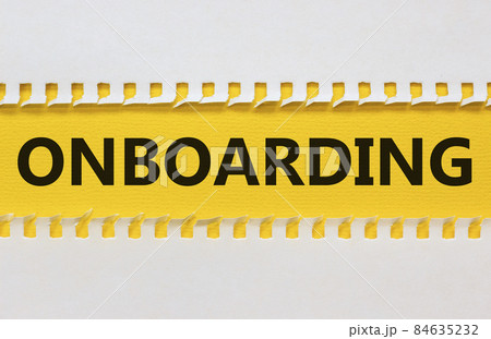 Onboarding success symbol. White and yellow paper with the word Onboarding on beautiful yellow background. Business and onboarding success concept. Copy space. 84635232