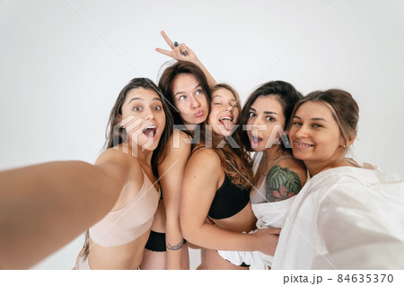 Diverse models wearing comfortable underwear take selfie Diverse models wearing comfortable underwear take selfie 84635370