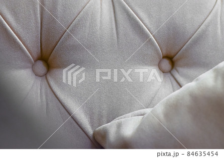 sofa pillow, comfortable couch cushion in beige neutral color, soft cozy domestic furniture texture 84635454