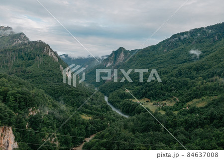Tara River, view from the bridge, north Montenegro. Canyon of river Tara, deepest canyon in the Europe, second in the world. State of Montenegro Tara River, view from the bridge, north Montenegro. Canyon of river Tara, deepest canyon in the Europe, second in the world. State of Montenegro 84637008