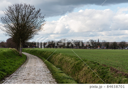 Paved road through a rural scenery 84638701