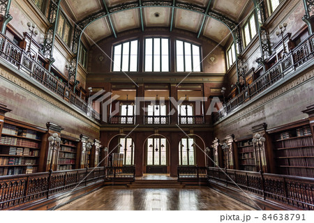 Brussels, Belgium - 02 15 2018: Local tourists visiting the interior of the Solvay library Brussels, Belgium - 02 15 2018: Local tourists visiting the interior of the Solvay library 84638791