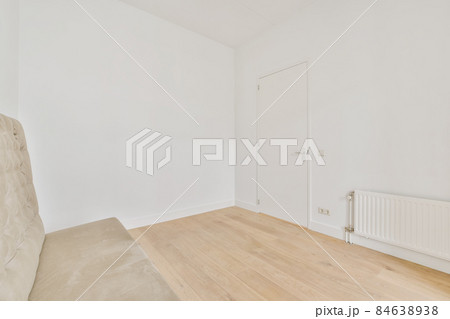 Modern room with wooden floor and white walls 84638938