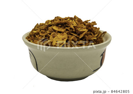 Dried chilli paste with crispy shrimp thai style or Crispy shrimp chilli paste in ceramic white cup isolated on white background. 84642805