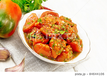 Tomatoes Korean in plate on board Tomatoes Korean in plate on board 84644106