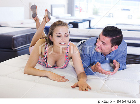 Man and woman choosing mattress 84644269