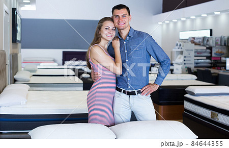 Portrait of married couple choosing mattresses 84644355