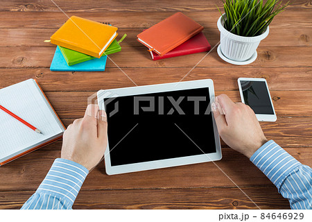 businessman with a tablet, works in the office businessman with a tablet, works in the office 84646929