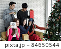 Selfie of group young Asian with gifts at home in celebrating Christmas festival. 84650544
