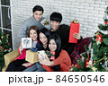 Selfie of group young Asian with gifts at home in celebrating Christmas festival. 84650546