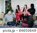 Funny party of young Asian with clink glasses and drank wine in celebrate Christmas festival. 84650649