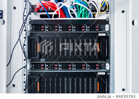Array of data storage hard drives in internet data center 84650763