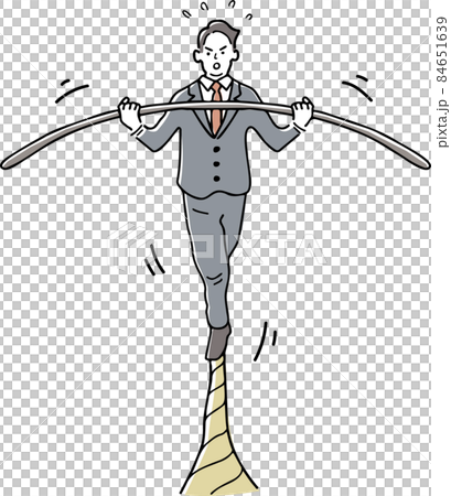 A man walking a tightrope while balancing 84651639