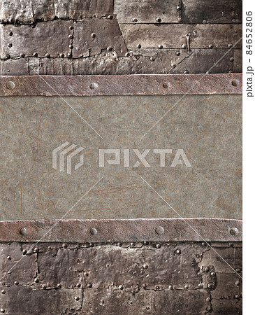 Grunge background in steampunk style. Texture of old metal with rivets and rusty frame 84652806