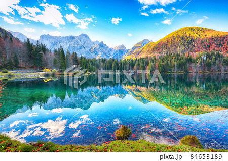Astonishing view of Fusine lake with Mangart peak on background 84653189