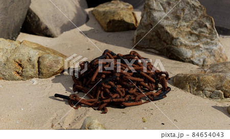 old rusted chain in the sand old rusted chain in the sand 84654043