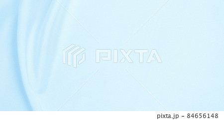 Smooth elegant blue silk or satin luxury cloth texture as abstract background. Luxurious background design 84656148