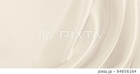 Smooth elegant golden silk or satin luxury cloth texture as wedding background. Luxurious background design. In Sepia toned. Retro style 84656164