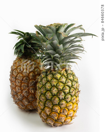 Ripe pineapple isolated on white background. 84660378
