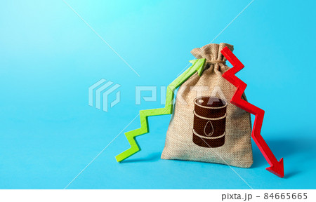 Bag with oil barrel and up down arrows. Energy crisis. Unstable power-generating and fuel prices. Chemical and transport industries. Speculation on stock exchange. Imbalance global supply and demand. 84665665