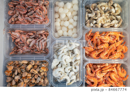 Frozen Seafood in fridge at the fish market. Frozen Seafood in fridge at the fish market. 84667774