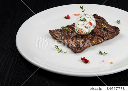 Grilled skirt beef meat steak on a plate 84667778
