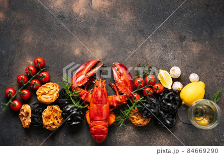 Food background with lobster and pasta 84669290