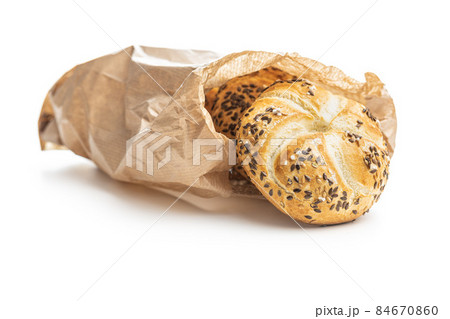 Four baked french buns with seeds Four baked french buns with seeds 84670860