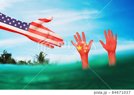 Concept on the topic of help to China by American colleagues in a difficult situation. International relationships Concept on the topic of help to China by American colleagues in a difficult situation. International relationships 84671037
