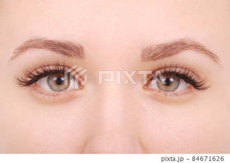 Beautiful woman eyes with long eyelashes. Studio shot Beautiful woman eyes with long eyelashes. Studio shot 84671626