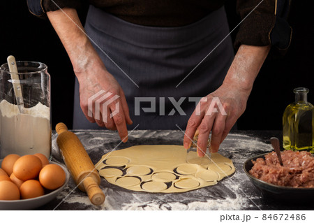 Process of preparing a traditional Russian dish dumplings Process of preparing a traditional Russian dish dumplings 84672486