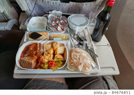 Airline food on the tray 84676851