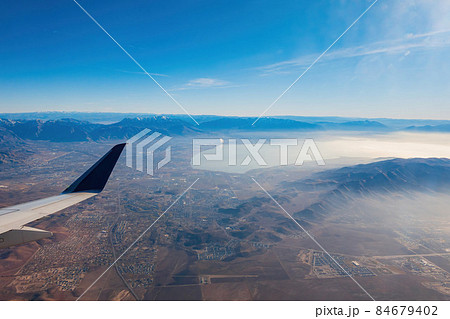Aerial view of the Utah Lake and city around Aerial view of the Utah Lake and city around 84679402