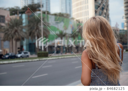 Young woman enjoying view of Dubai downtown. 84682125