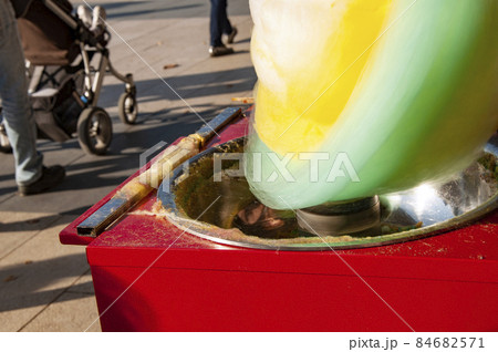 red cotton candy machine in a park closeup high quality photo red cotton candy machine in a park closeup high quality photo 84682571