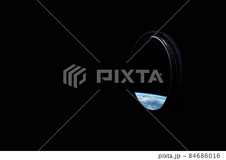 Spaceship windows overlooking the blue planet earth and the ISS station. Space travel concept. Place for design and text 84686016