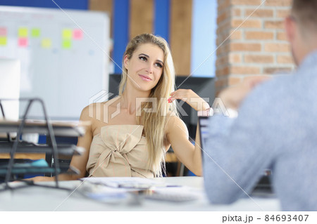Attractive female sitting on boss seat, control big corporation, female company leader Attractive female sitting on boss seat, control big corporation, female company leader 84693407