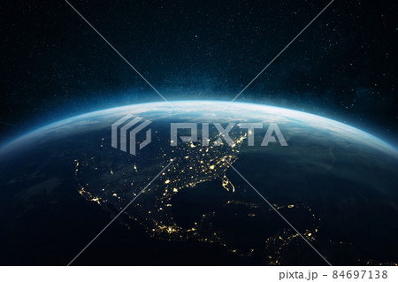 Beautiful blue planet earth with lights of night cities USA, South and North America. View of the night planet from space Beautiful blue planet earth with lights of night cities USA, South and North America. View of the night planet from space 84697138