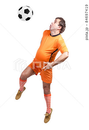 recreational fat football player kicking the ball isolated on a white background 84697419