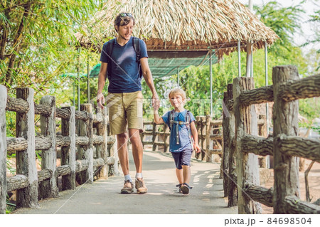 Father and son at the zoo. Spending day with family at the zoo 84698504